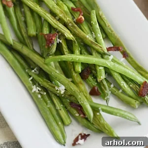 sauteed green with bacon and lemon on serving platter