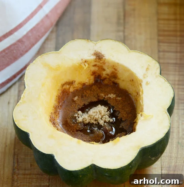uncooked acorn squash with maple, brown sugar and cinnamon