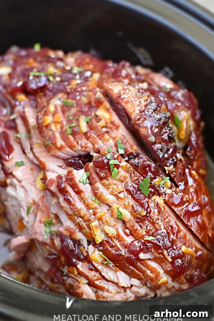 close up of spiral cut ham in slow cooker