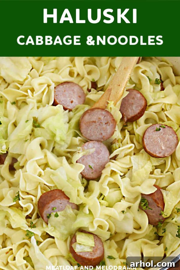 Close-up view of Haluski with Kielbasa, showing the golden-brown smoked sausage, tender cabbage, and buttery egg noodles in a rustic setting.