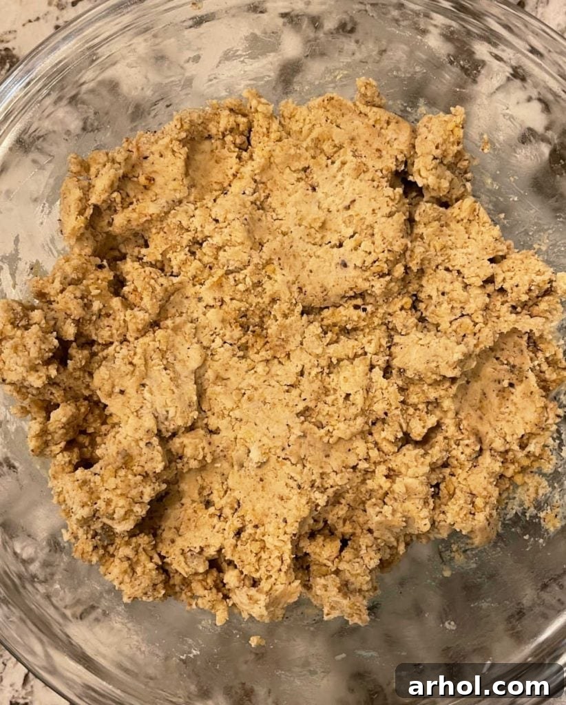 Thick, rich walnut crescent cookie dough ready for shaping.