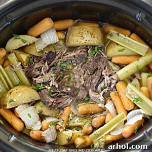 Shredded fall-apart chuck roast with potatoes, carrots, and celery in the Crock-Pot