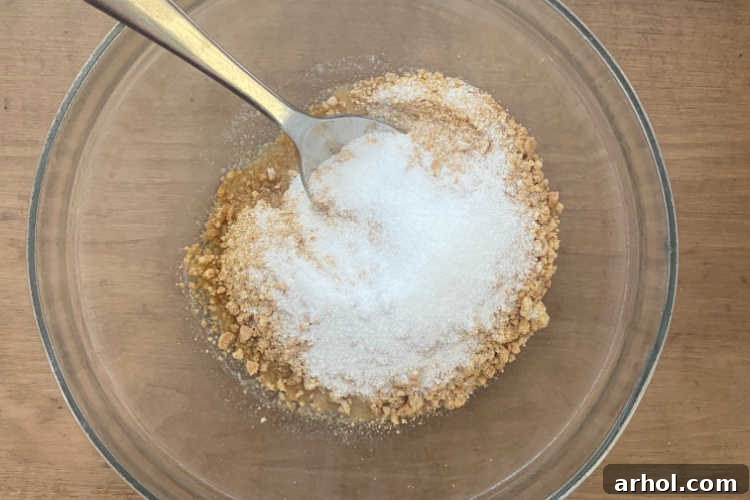 mix graham crackers, butter and sugar in mixing bowl