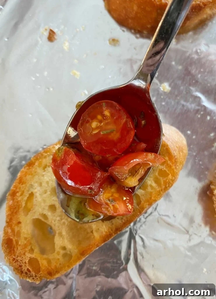 spoon chopped tomatoes over toasted bread slices