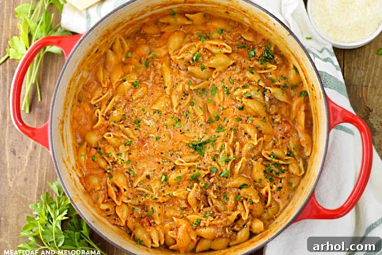Creamy one-pot shells and beef pasta, a 30-minute dinner, served in a skillet.