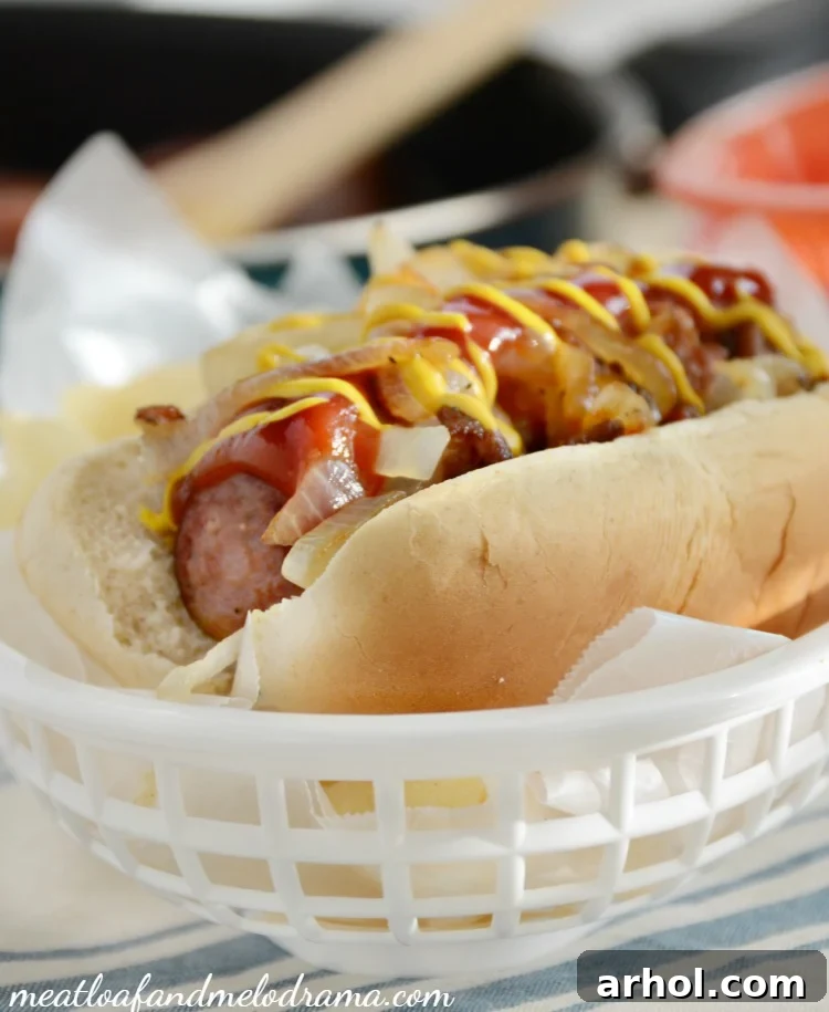 Delicious Polish Sausage Dog topped with caramelized onions and mustard