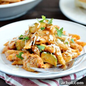 One Pot Creamy Garlic Chicken Pasta with fresh parsley garnish.