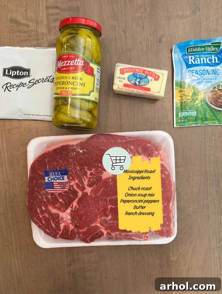 Boneless beef chuck roast, onion soup mix, peperoncini peppers, butter, and dry ranch dressing mix displayed before cooking