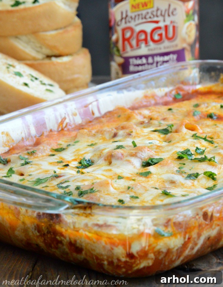 One-Pan Rigatoni Sausage Bake with garlic bread and Ragu Homestyle Roasted Garlic Sauce