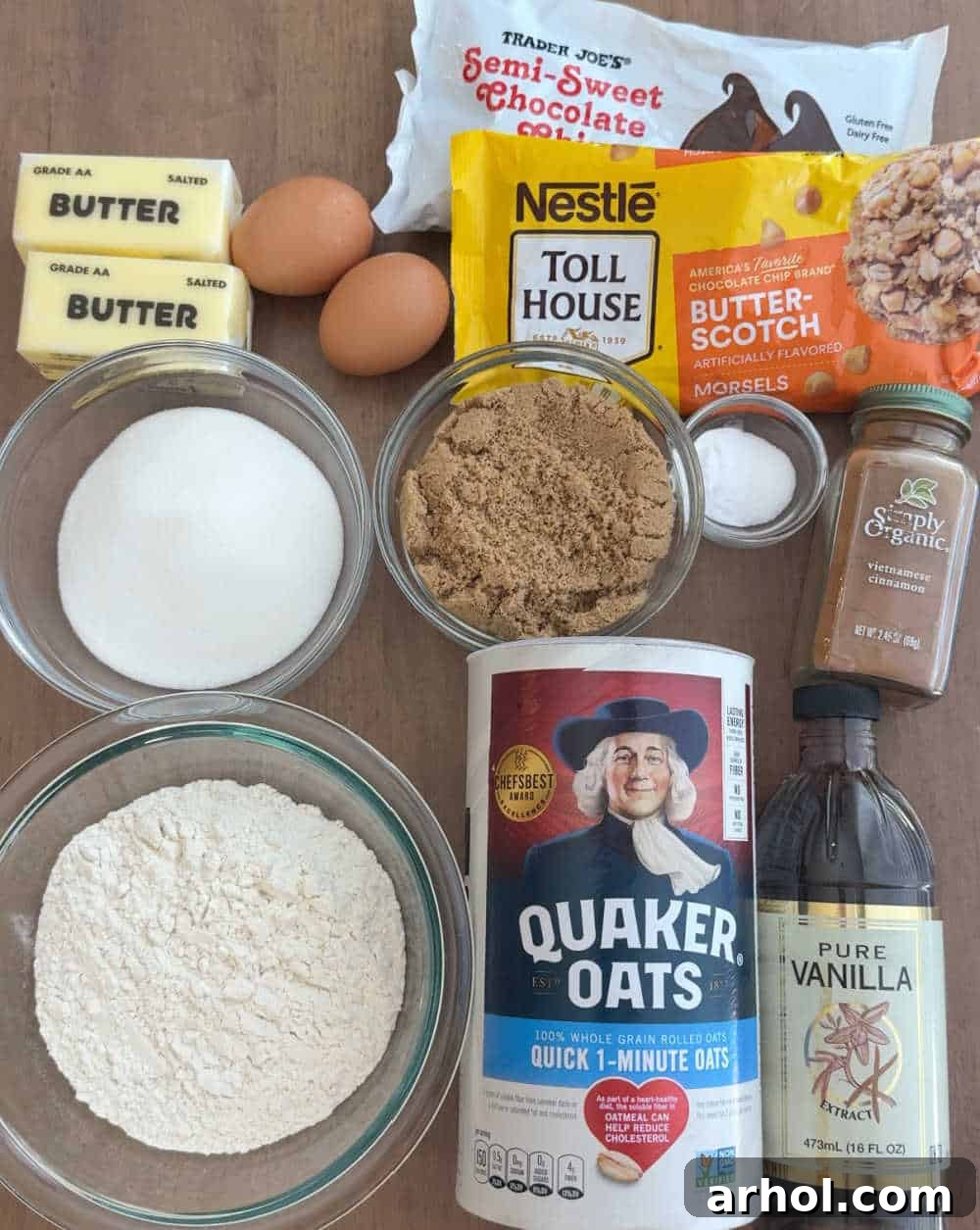 A trio of essential baking ingredients: Quaker oats, rich butterscotch chips, and decadent chocolate morsels, laid out ready for baking.