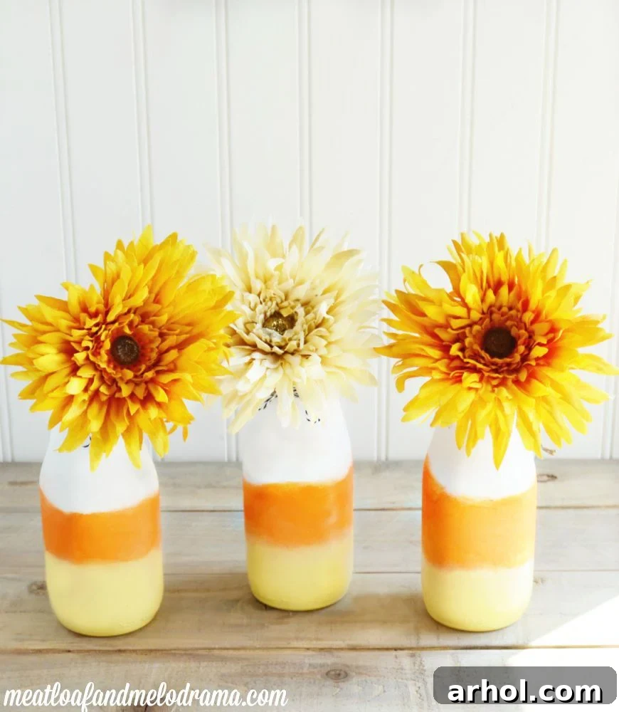 DIY Candy Corn Vases made from glass bottles
