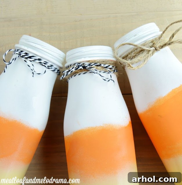 Twine tied around finished candy corn vases for fall decoration