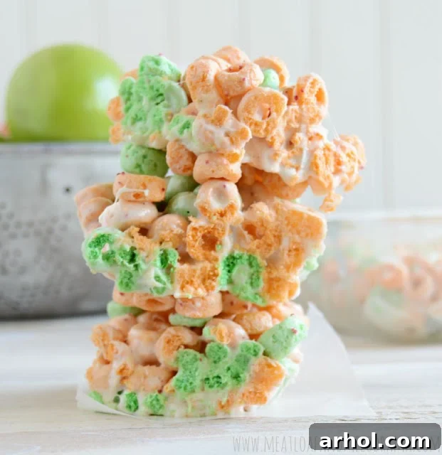 Crispy cereal bars made with Apple Jacks and marshmallows arranged on a plate