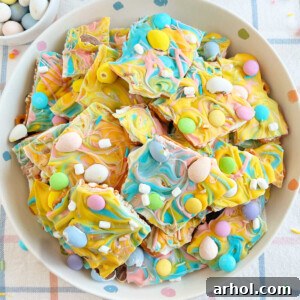 pastel colored Easter bark with mini eggs, marshmallow bits and pretzels.