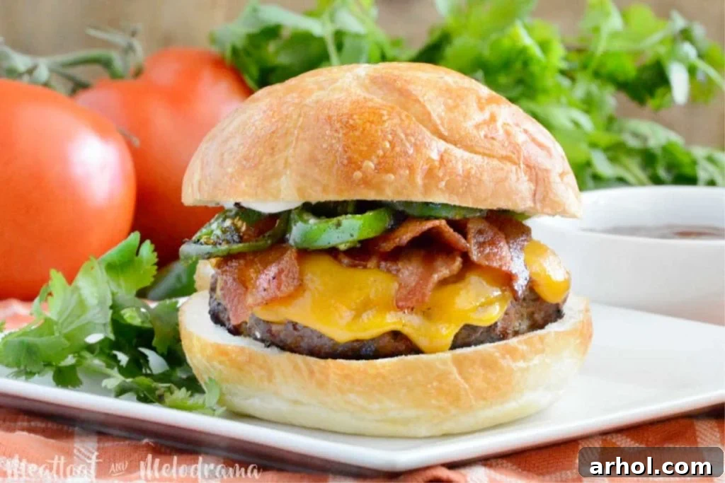 jalapeno bacon cheeseburger on a white plate