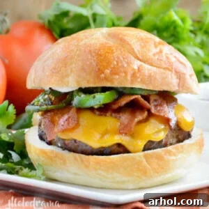 jalapeno bacon cheeseburger on a white plate