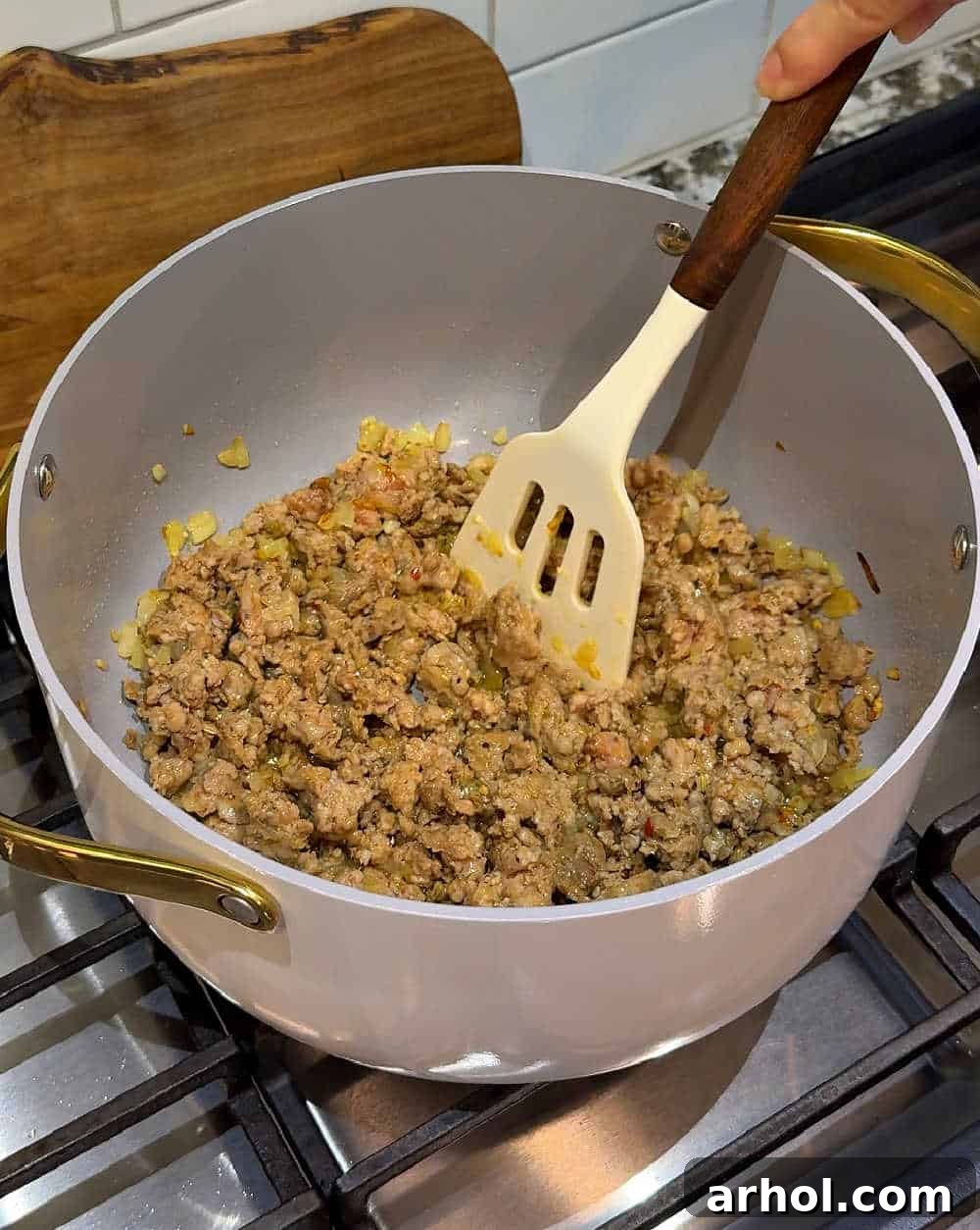 Step 1: Browning Italian sausage in a large pot.