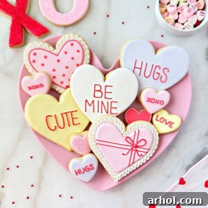 Heart-shaped Valentine cookies decorated with royal icing.
