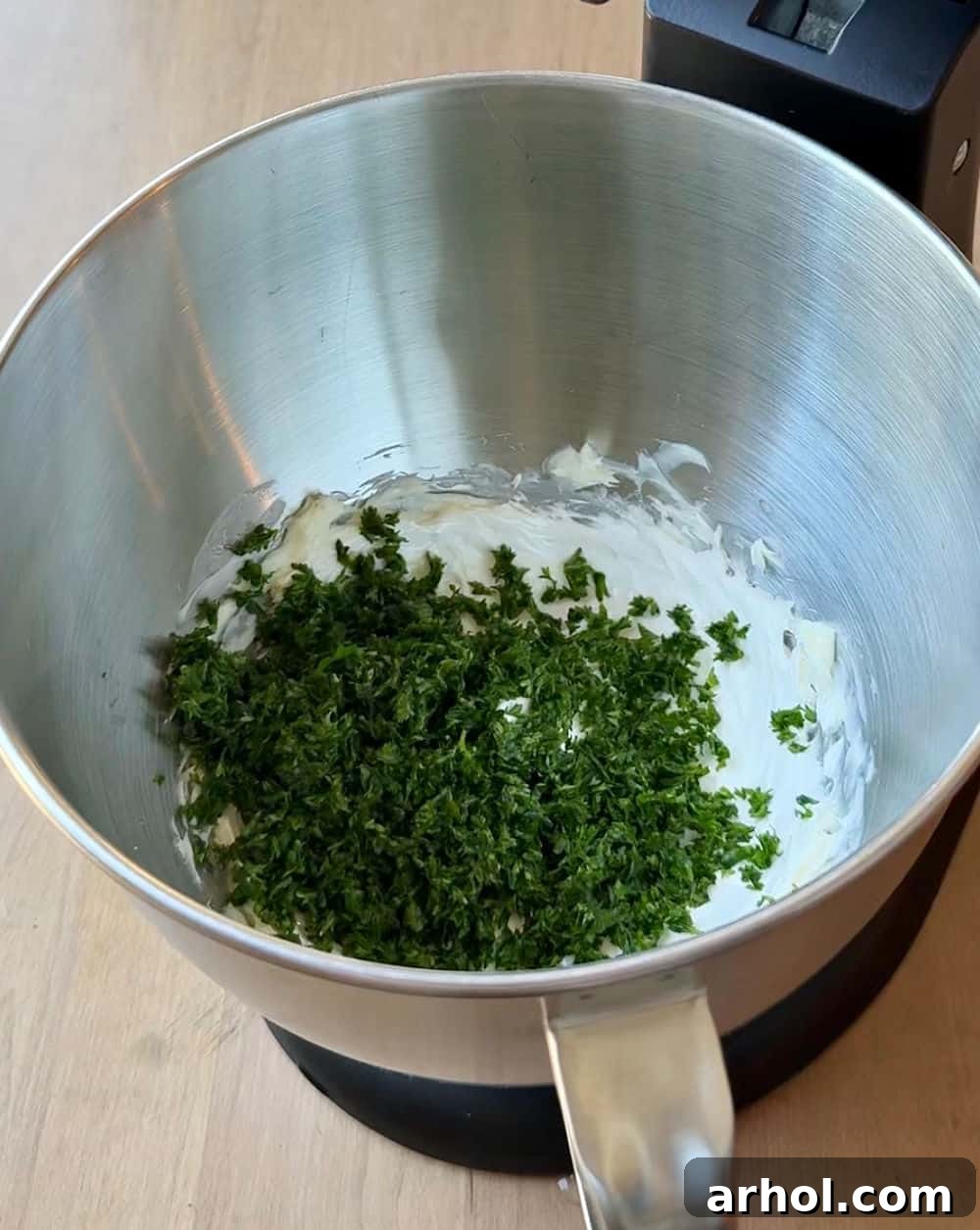 adding chopped herbs.