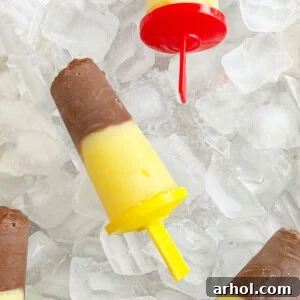 Homemade pudding pops with vanilla and chocolate pudding over ice, a cool summer treat.