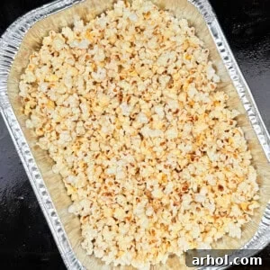 Freshly popped popcorn on the Blackstone griddle, ready for a fun snack.