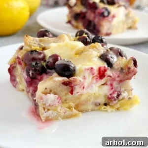 A slice of lemon blueberry bagel breakfast casserole on a plate