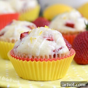 Strawberry muffins topped with a lemon sugar glaze