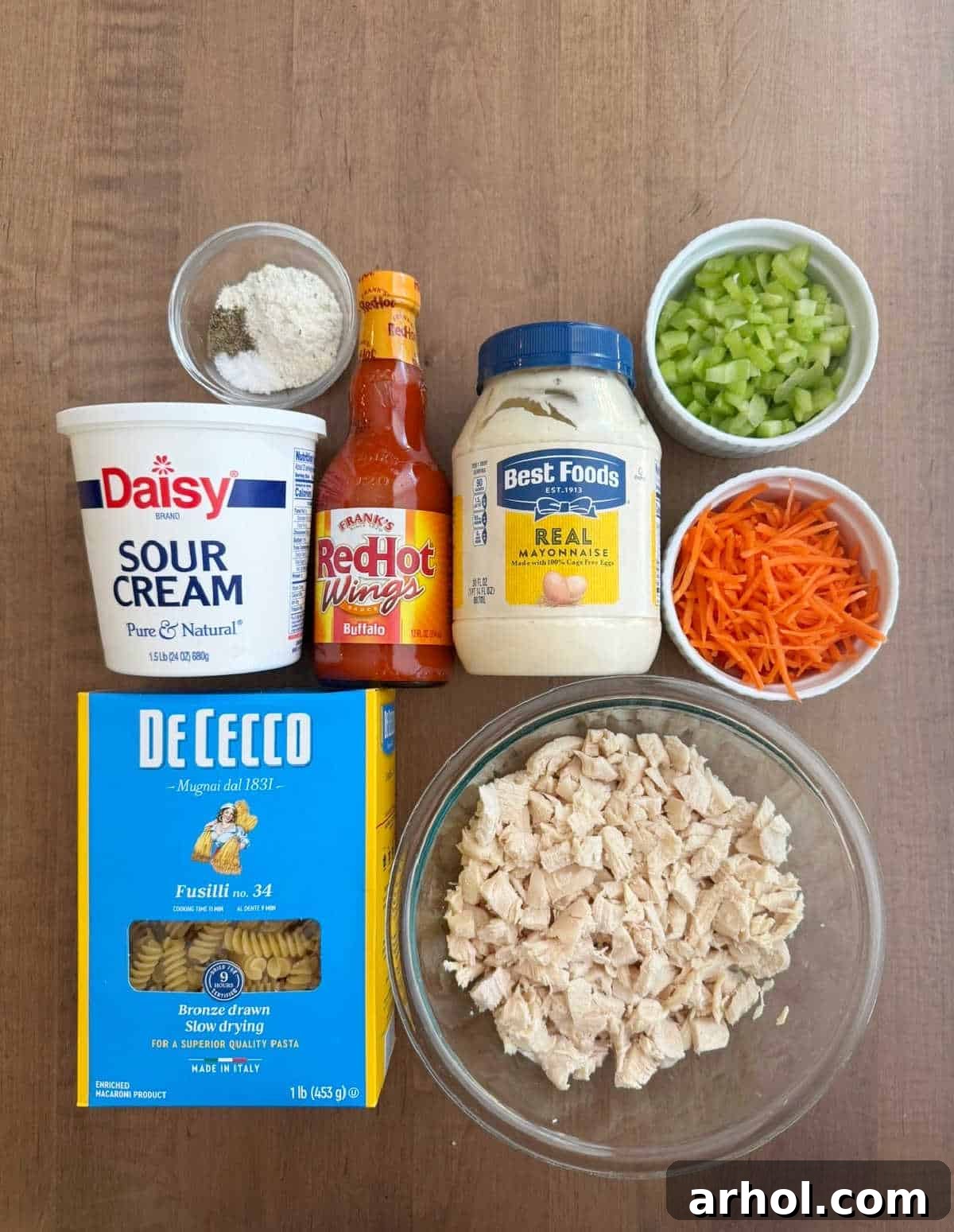 fusilli pasta, cooked chicken, carrots, celery and dressing ingredients.