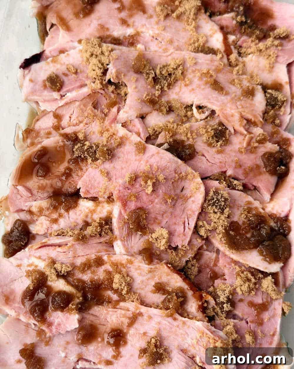 Perfect Oven-Baked Ham Slices: Easy, Juicy Recipe for Weeknight Dinners 7 adding water.
