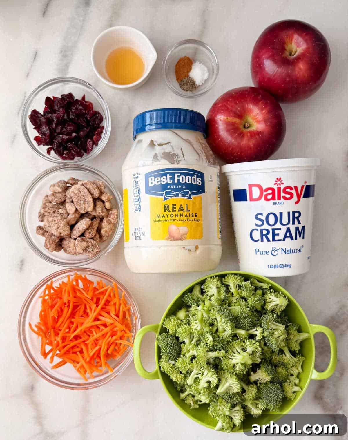 broccoli florets, craisins, apples, carrots, pecans, dressing.