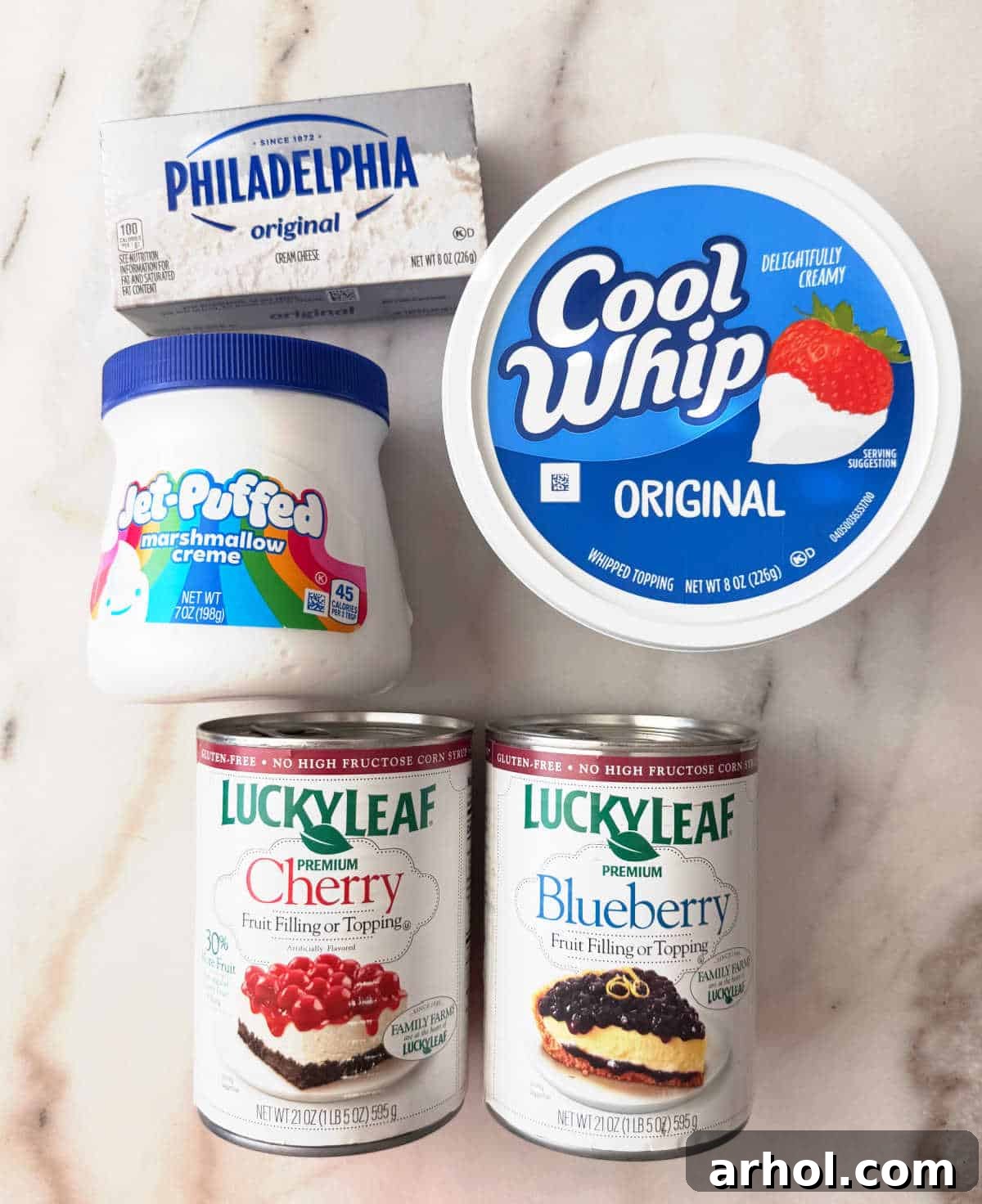 Patriotic Red, White & Blue Cheesecake Dip Recipe for Parties 4 cans of pie filling, cool whip, marshmallow fluff and cream cheese.