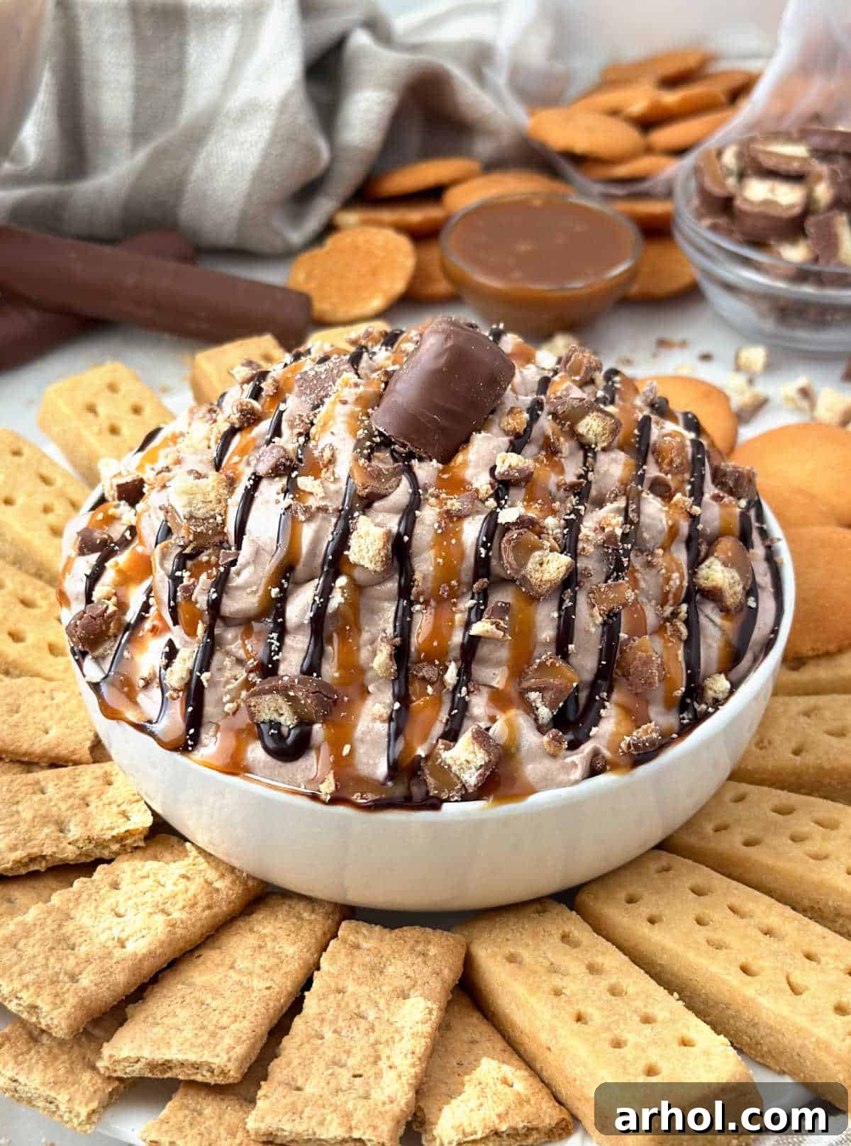 Twix dip in bowl with dippers.