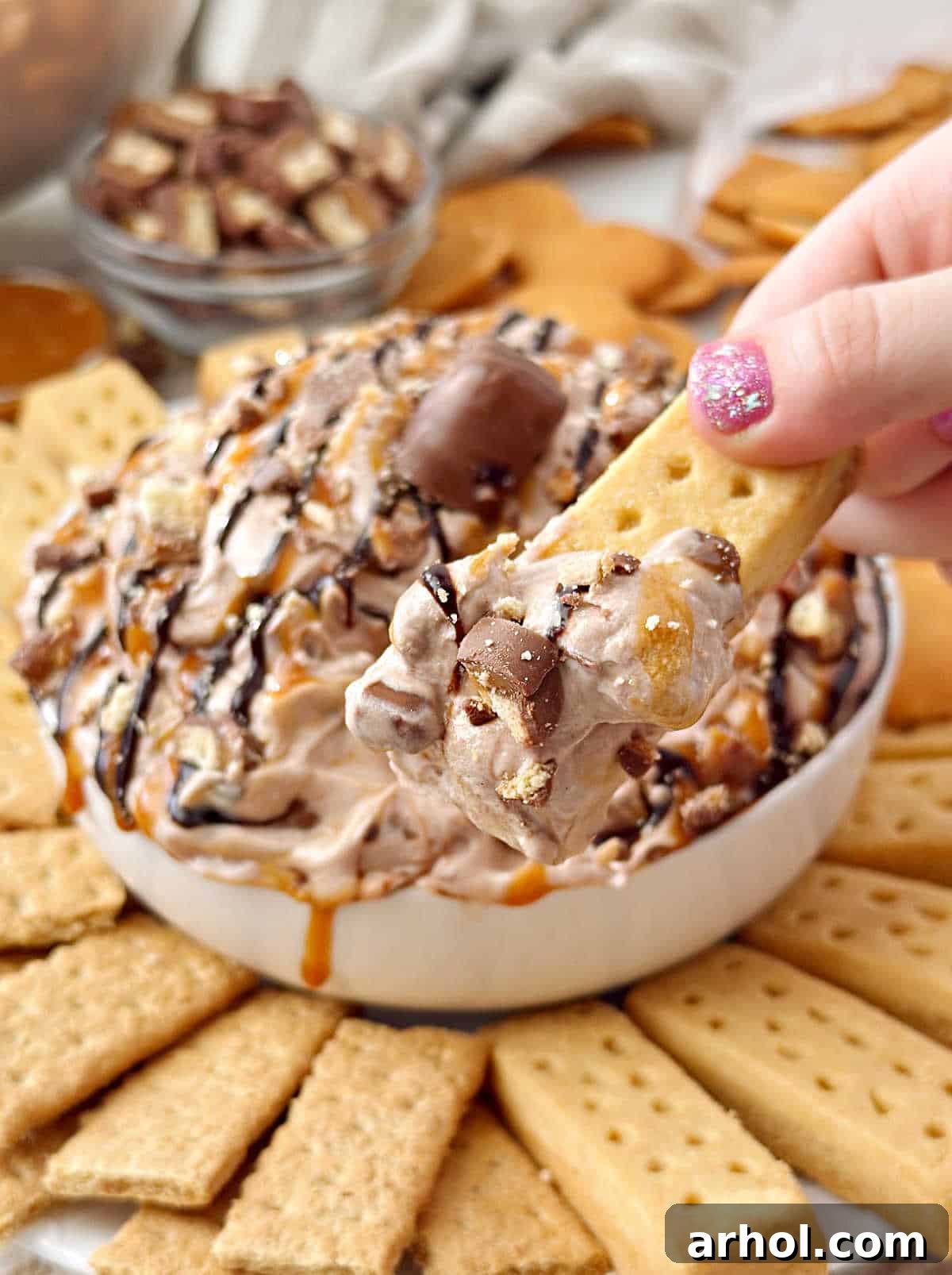 Twix dip on shortbread cookie.