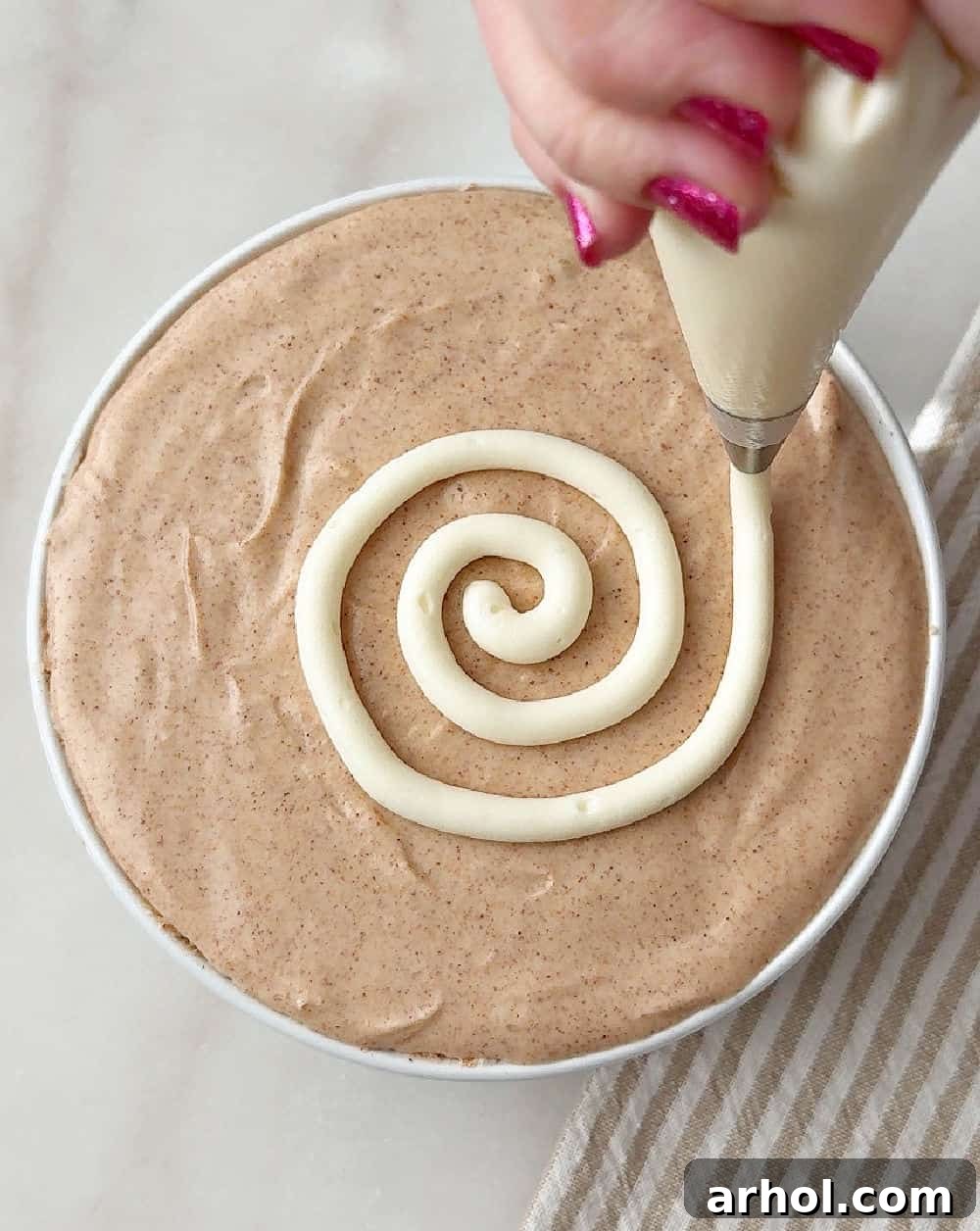piping icing on top of dip.