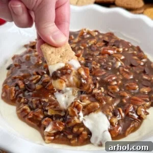 pecan pie dip on graham cracker.