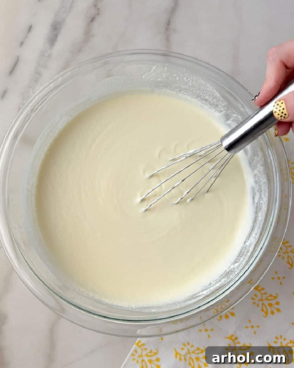 No-Bake Creamy Lemon Jello Pie 7 Whisking the lemon filling until smooth and creamy.