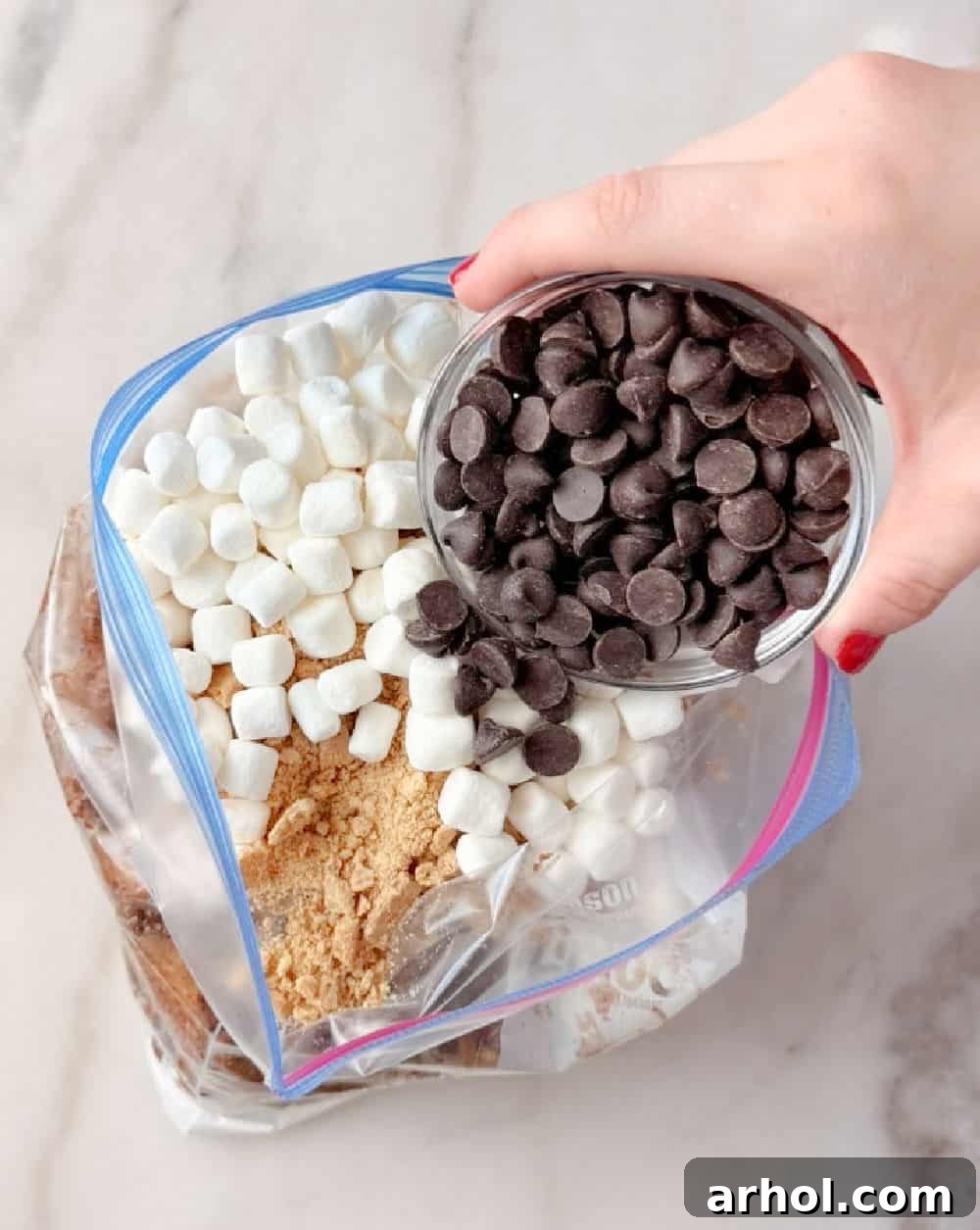 adding ingredients to freezer bag.