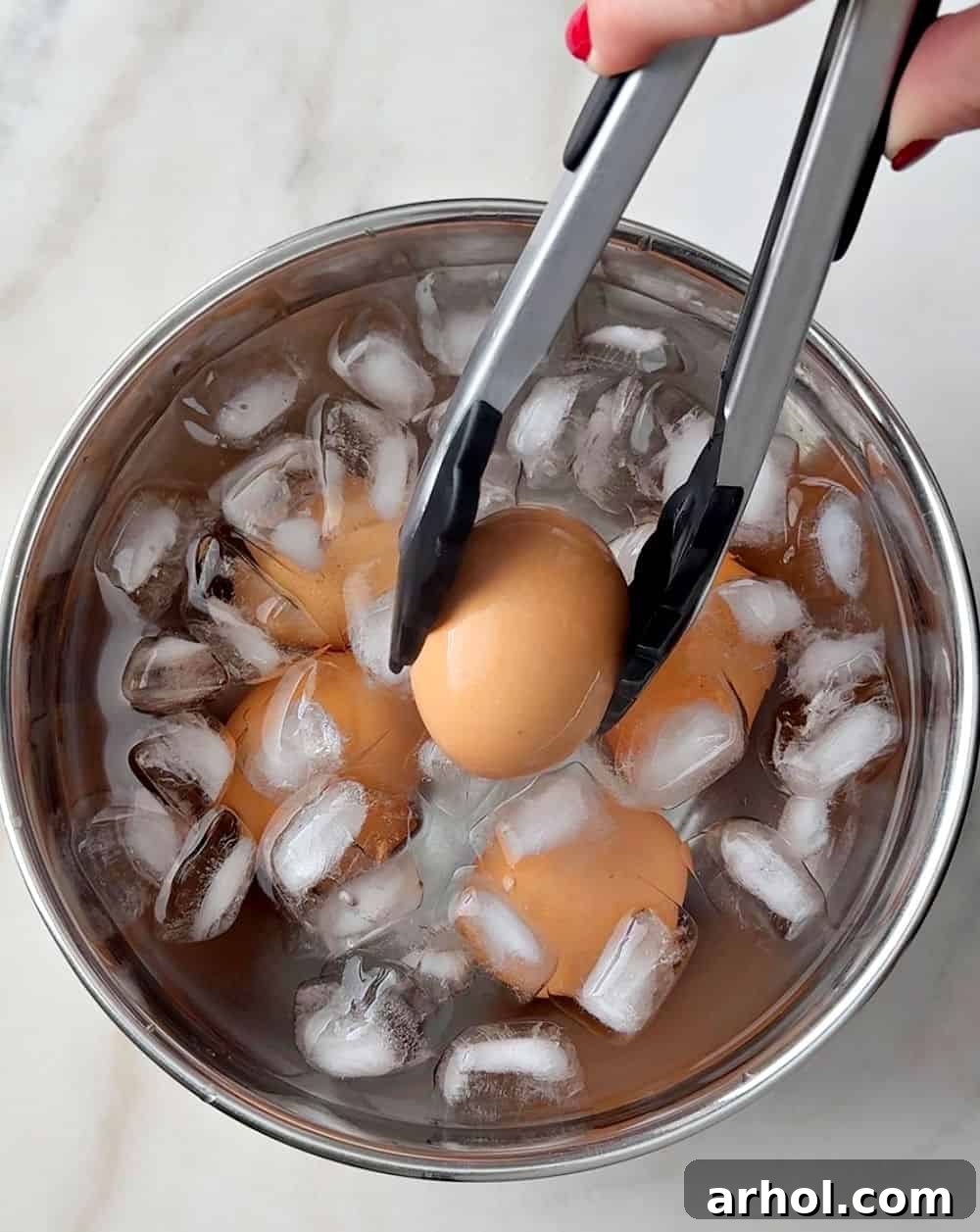 placing eggs in ice water.