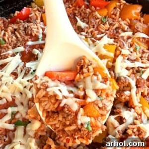 unstuffed peppers with cheese on a serving spoon