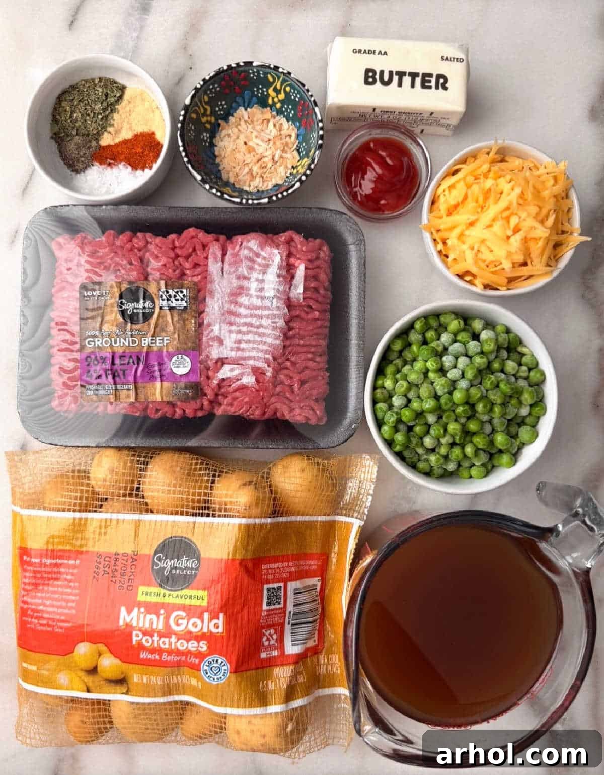 ground beef, mini potatoes, peas, butter, broth, ketchup, spices.