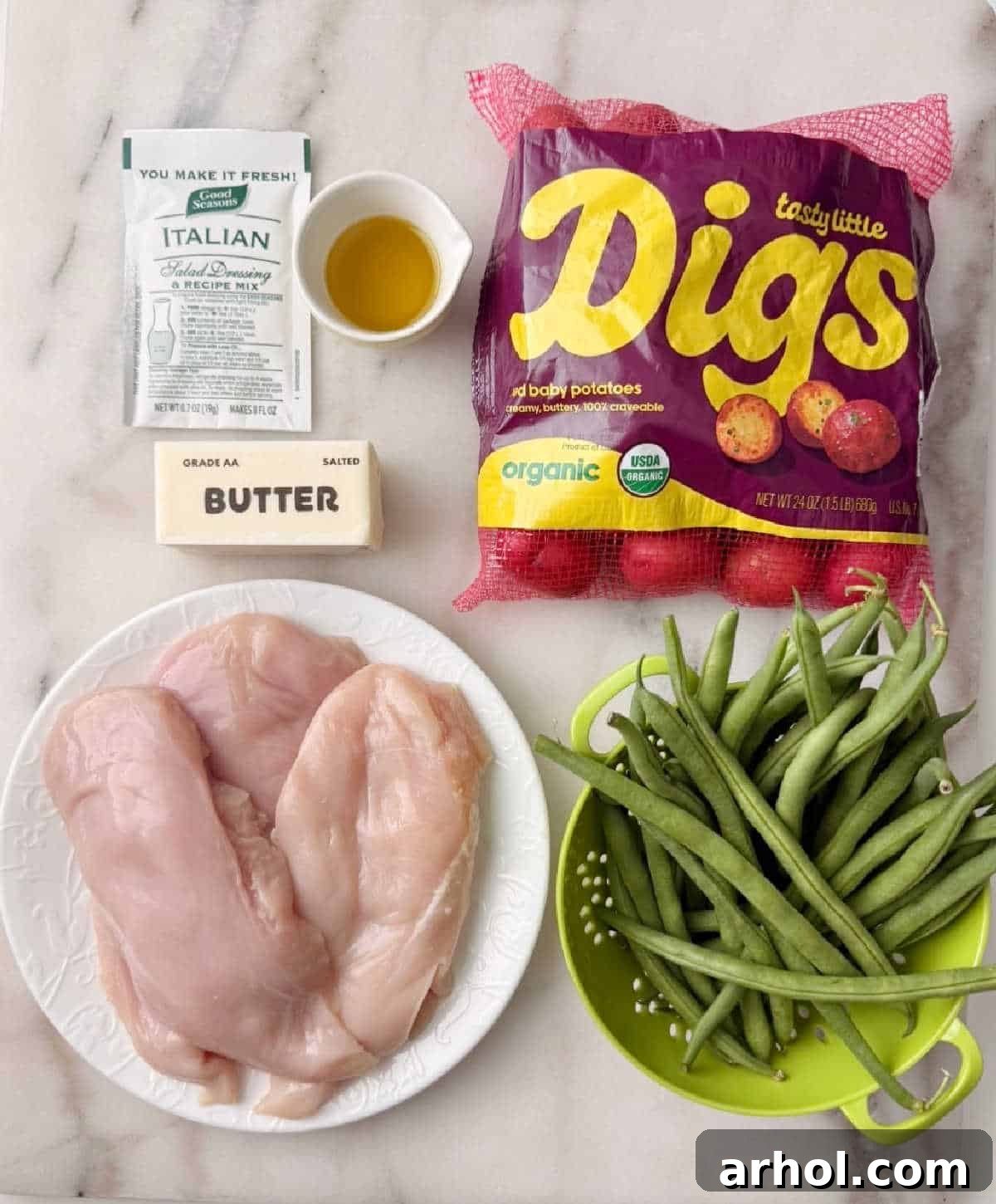 baby red potatoes, green beans, chicken breast, butter, oil, dressing mix.