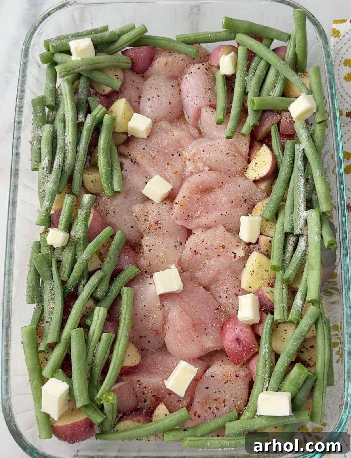 adding pats of butter.