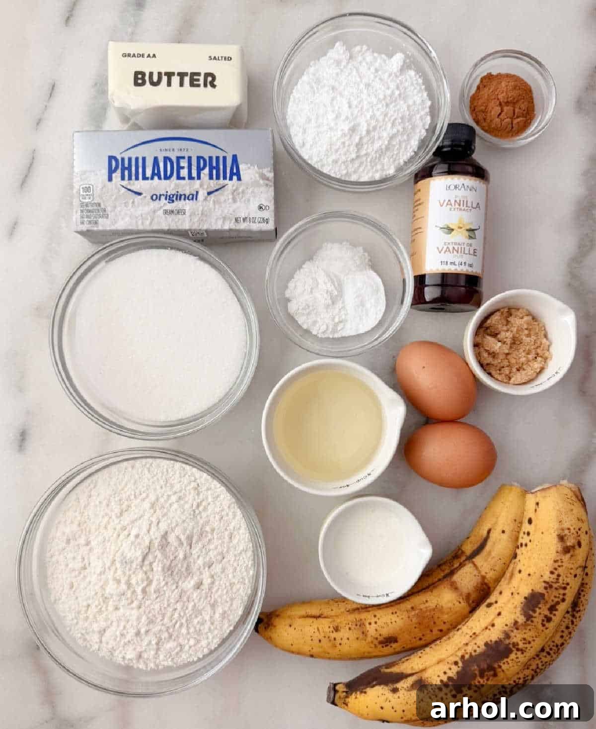 bananas, flour, sugar, oil, cream, eggs, cinnamon, vanilla, cream cheese, butter, salt, baking soda and powder.
