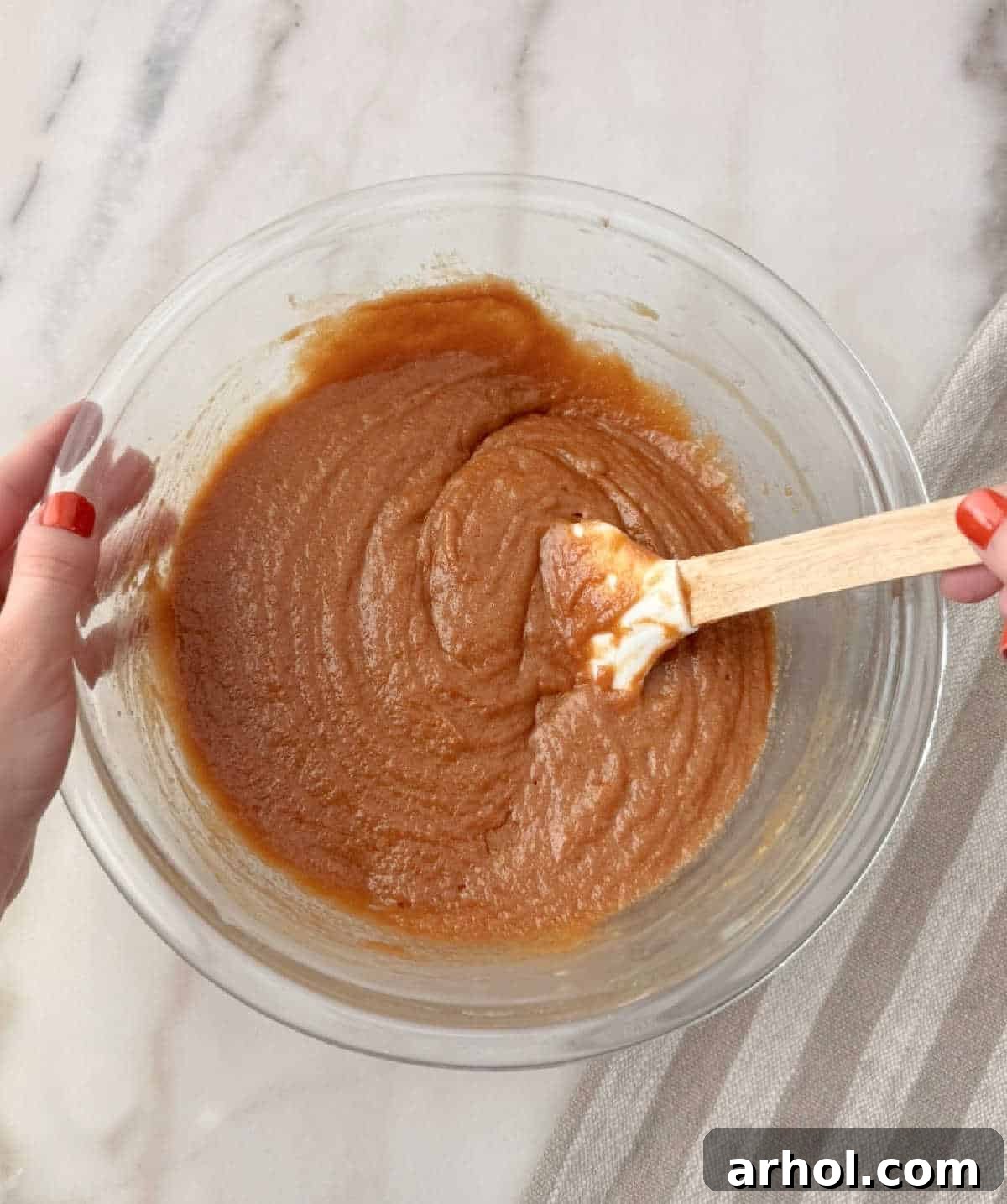 stirring wet ingredients.